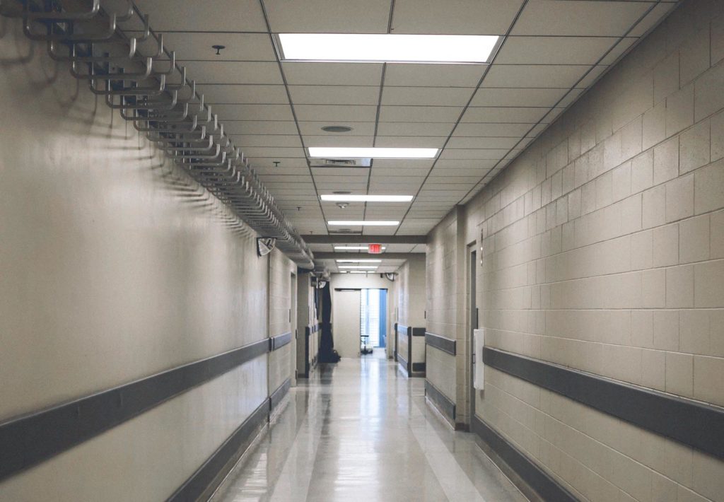 LED troffers in a prison hallway